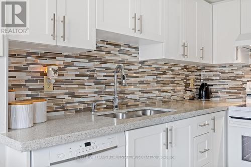 23 - 5230 Glen Erin Drive, Mississauga, ON - Indoor Photo Showing Kitchen With Double Sink