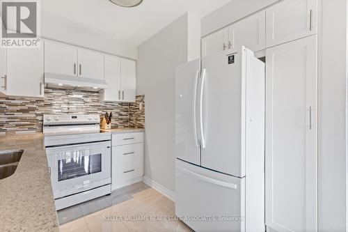 23 - 5230 Glen Erin Drive, Mississauga, ON - Indoor Photo Showing Kitchen