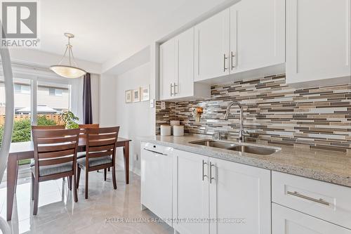 23 - 5230 Glen Erin Drive, Mississauga, ON - Indoor Photo Showing Kitchen With Double Sink