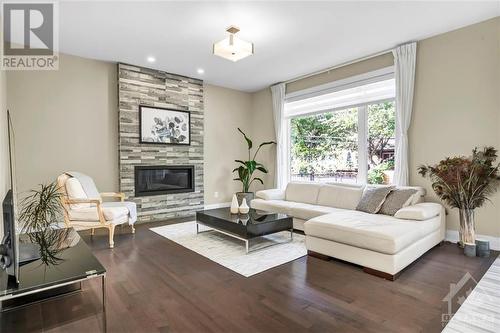 1399 Mory Street, Ottawa, ON - Indoor Photo Showing Living Room With Fireplace