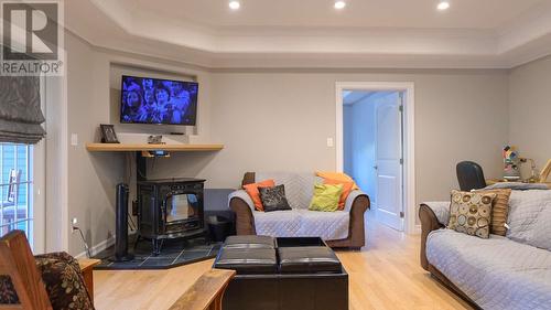 8 Warren Drive, Pasadena, NL - Indoor Photo Showing Living Room With Fireplace