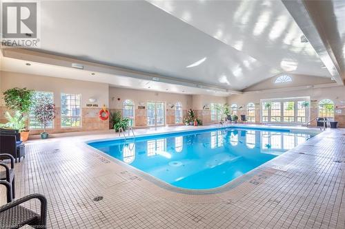 16 Twenty Place Boulevard, Mount Hope, ON - Indoor Photo Showing Other Room With In Ground Pool