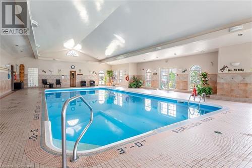 16 Twenty Place Boulevard, Mount Hope, ON - Indoor Photo Showing Other Room With In Ground Pool