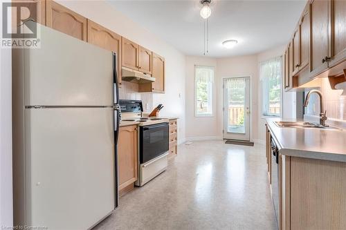 16 Twenty Place Boulevard, Mount Hope, ON - Indoor Photo Showing Kitchen With Double Sink