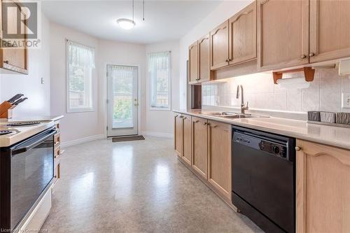 16 Twenty Place Boulevard, Mount Hope, ON - Indoor Photo Showing Kitchen With Double Sink