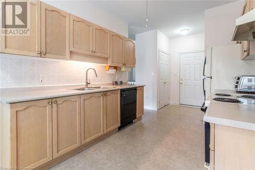 16 Twenty Place Boulevard, Mount Hope, ON - Indoor Photo Showing Kitchen With Double Sink