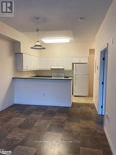 105 - 333 Lafontaine Road W, Tiny (Lafontaine), ON - Indoor Photo Showing Kitchen