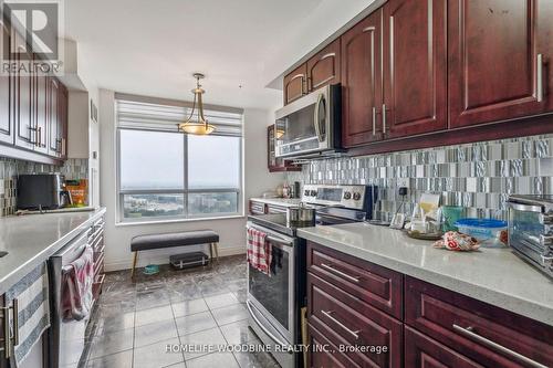 2718 - 700 Humberwood Boulevard, Toronto, ON - Indoor Photo Showing Kitchen