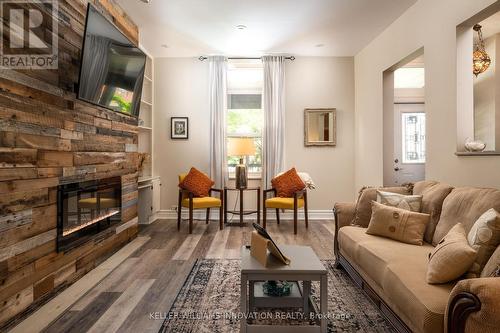 128 Park Street N, Hamilton, ON - Indoor Photo Showing Living Room With Fireplace