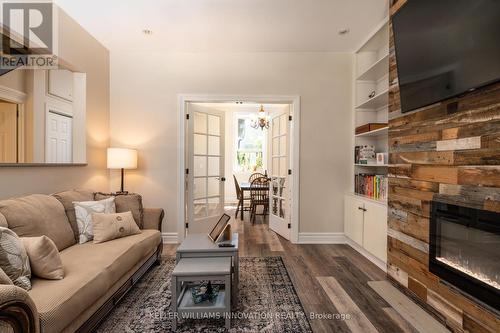 128 Park Street N, Hamilton, ON - Indoor Photo Showing Living Room With Fireplace