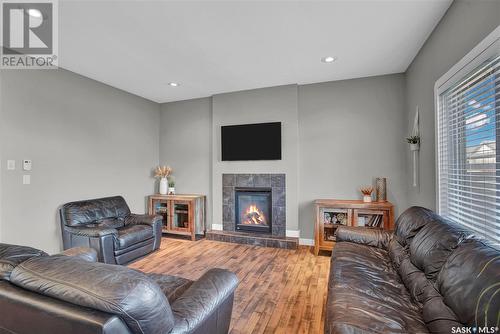 251 Baltzan Boulevard, Saskatoon, SK - Indoor Photo Showing Living Room With Fireplace