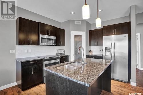 251 Baltzan Boulevard, Saskatoon, SK - Indoor Photo Showing Kitchen With Double Sink With Upgraded Kitchen