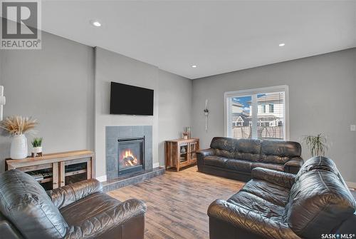 251 Baltzan Boulevard, Saskatoon, SK - Indoor Photo Showing Living Room With Fireplace