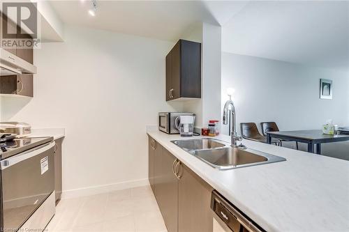 10 Wilby Crescent Unit# 309, Toronto, ON - Indoor Photo Showing Kitchen With Double Sink