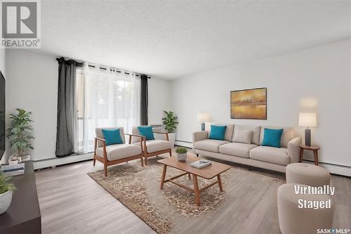 11 111 St Lawrence Crescent, Saskatoon, SK - Indoor Photo Showing Living Room