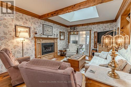 63 Nelson Street, Barrie, ON - Indoor Photo Showing Living Room With Fireplace