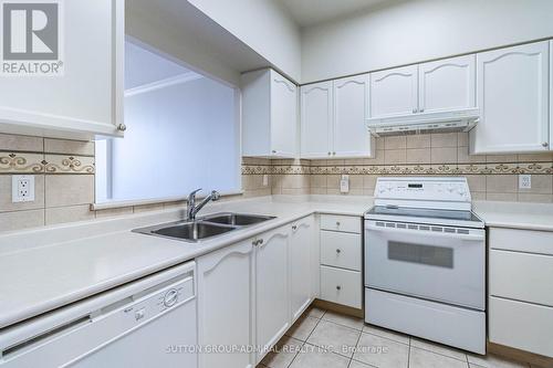 1515 - 100 Burloak Drive, Burlington, ON - Indoor Photo Showing Kitchen With Double Sink