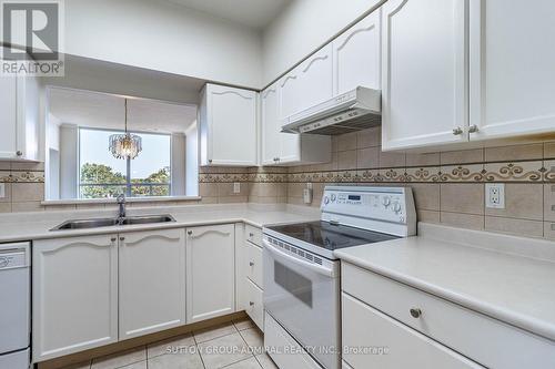 1515 - 100 Burloak Drive, Burlington, ON - Indoor Photo Showing Kitchen With Double Sink