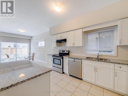 11 Burcombe Cross, Guelph, ON - Indoor Photo Showing Kitchen With Double Sink