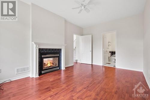 Master bedroom with ensuite and walk in closet - 16 Morenz Terrace, Ottawa, ON - Indoor With Fireplace