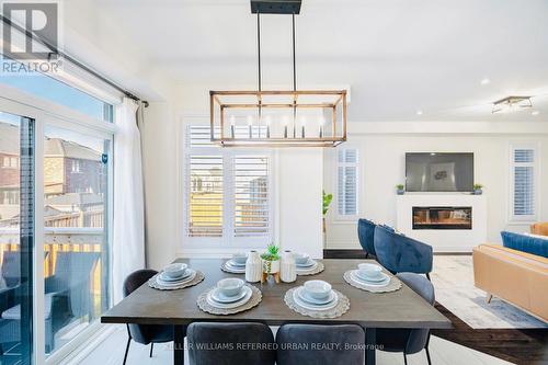 1358 Blackmore Street, Innisfil, ON - Indoor Photo Showing Dining Room With Fireplace