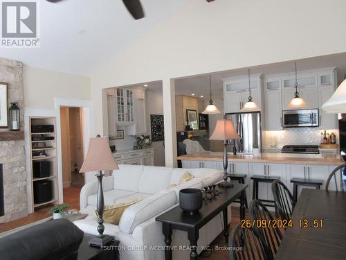 1189 Sunnidale Road, Springwater, ON - Indoor Photo Showing Kitchen With Fireplace With Upgraded Kitchen