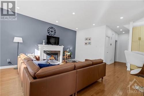 145 Baroness Drive, Ottawa, ON - Indoor Photo Showing Living Room With Fireplace