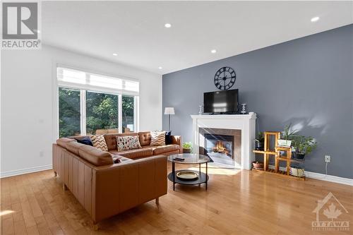 145 Baroness Drive, Ottawa, ON - Indoor Photo Showing Living Room With Fireplace