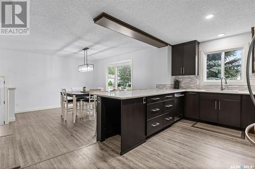 102 Adilman Drive, Saskatoon, SK - Indoor Photo Showing Kitchen With Upgraded Kitchen