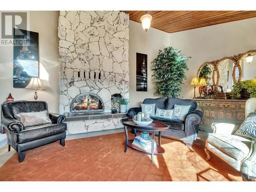 2463 Irvine Ave, Merritt, BC - Indoor Photo Showing Living Room With Fireplace