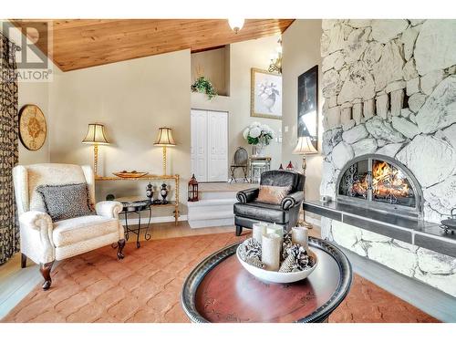 2463 Irvine Ave, Merritt, BC - Indoor Photo Showing Living Room With Fireplace