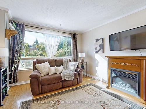 357 Taylor Mills Dr N, Richmond Hill, ON - Indoor Photo Showing Living Room With Fireplace