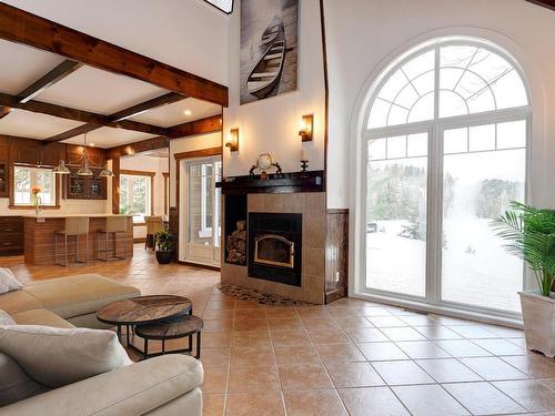 Salon - 8181 Av. Paquette, Chertsey, QC - Indoor Photo Showing Living Room With Fireplace