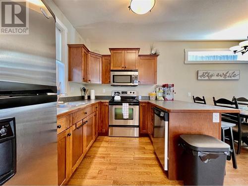 8843 97A Highway Unit# 43, Swansea Point, BC - Indoor Photo Showing Kitchen With Double Sink