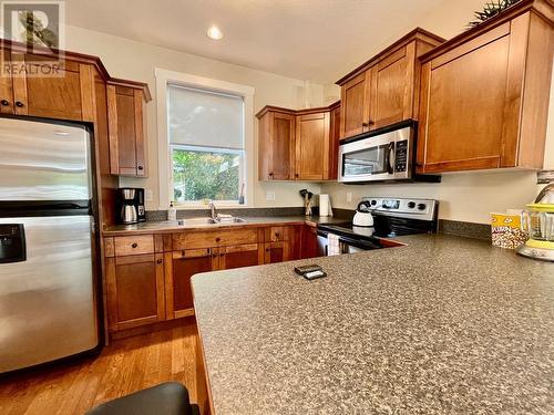 8843 97A Highway Unit# 43, Swansea Point, BC - Indoor Photo Showing Kitchen With Double Sink