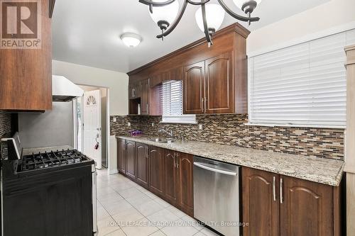 Upper - 11 Juniper Crescent, Brampton, ON - Indoor Photo Showing Kitchen With Double Sink