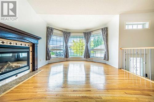 51 Ackerman Crescent, Red Deer, AB - Indoor Photo Showing Other Room With Fireplace