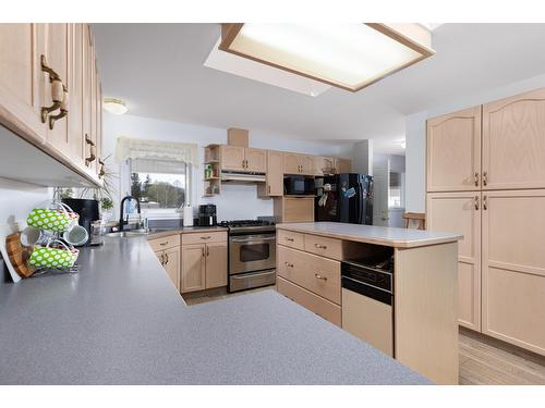 8011 Thompson Road, Kimberley, BC - Indoor Photo Showing Kitchen With Double Sink