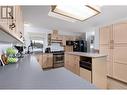 8011 Thompson Road, Kimberley, BC  - Indoor Photo Showing Kitchen With Double Sink 