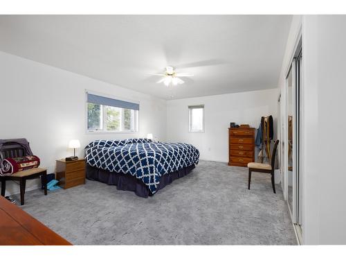 8011 Thompson Road, Kimberley, BC - Indoor Photo Showing Bedroom