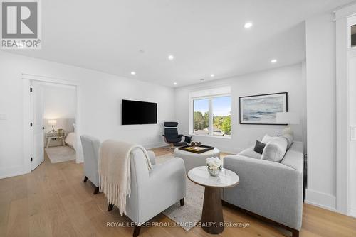 409 - 17 Cleave Avenue, Prince Edward County (Picton), ON - Indoor Photo Showing Living Room With Fireplace