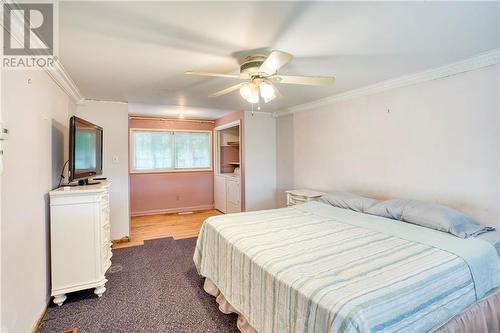 Primary bedroom w/laundry ... - 1215 Narrows Lock Road, Portland, ON - Indoor Photo Showing Bedroom