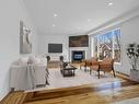 Salon - 7 Rue Vincent-Blouin, Kirkland, QC  - Indoor Photo Showing Living Room With Fireplace 