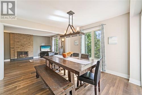 1837 Pilgrims Way, Oakville, ON - Indoor Photo Showing Dining Room With Fireplace