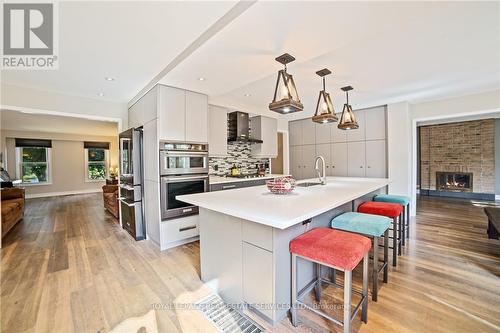 1837 Pilgrims Way, Oakville, ON - Indoor Photo Showing Kitchen With Fireplace With Upgraded Kitchen