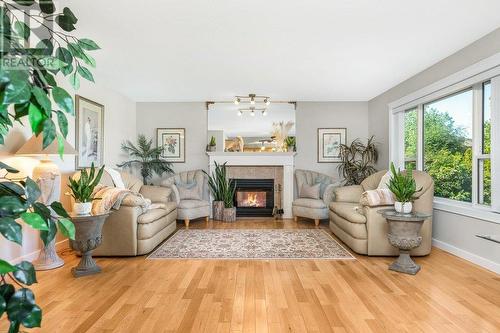 958 Mt Beaven Place, Vernon, BC - Indoor Photo Showing Living Room With Fireplace