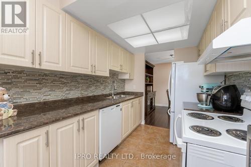 805 - 5 Lisa Street, Brampton, ON - Indoor Photo Showing Kitchen With Double Sink