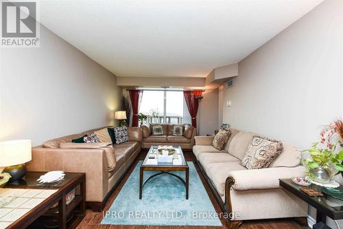 1406 - 35 Kingsbridge Garden Circle, Mississauga, ON - Indoor Photo Showing Living Room