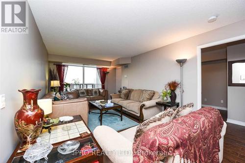 1406 - 35 Kingsbridge Garden Circle, Mississauga, ON - Indoor Photo Showing Living Room