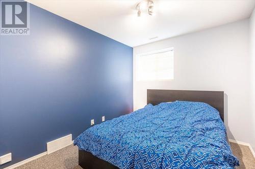 1200 Riverside Way Unit# 1230, Fernie, BC - Indoor Photo Showing Bedroom